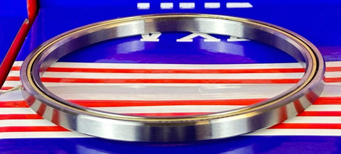 VA035CP0 Thin Section Bearing 3-1/2" x 4" x 1/4" inch displayed on a colorful background, showcasing its chrome steel construction.