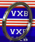 3-1/2" x 4-1/8" x 5/16" Thin Section Bearing VB035CP0 viewed from the side, showcasing chrome steel and brass cage construction.