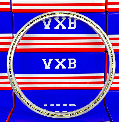 VB050CP0 Thin Section Bearing 5" x 5-5/8" x 5/16" inch displayed against blue and red boxes, showcasing open design and precision.