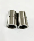 Pair of THK Ball Spline Nut LT 16 LT16UU for CNC axis motion, anti-backlash setup, shown close-up on white background.