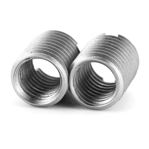 Close-up of two stainless steel insert nuts from Stainless Steel Thread Repair Tool Kit With 10 Insert Nuts M8 X 1.25 Female Threads And M10 X 1.25 Male Threads.