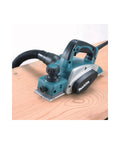 Three And A Quarter Inch Planer With Tool Case Six Point Five Amp Motor Delivers Fast Smooth Stock Removal For Professional Carpentry Woodworking And Framing Projects Including Window And Door Installations And Fine Finishing on wooden surface