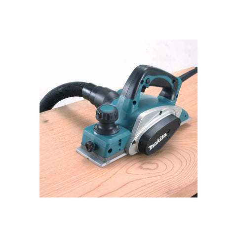 Three And A Quarter Inch Planer With Tool Case Six Point Five Amp Motor Delivers Fast Smooth Stock Removal For Professional Carpentry Woodworking And Framing Projects Including Window And Door Installations And Fine Finishing on wooden surface