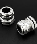 Two Three Quarter Inch NPT Brass Cable Gland Cord Grip Strain Relief For Electrical Wiring on black background