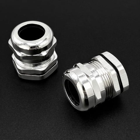 Two Three Quarter Inch NPT Brass Cable Gland Cord Grip Strain Relief For Electrical Wiring on black background