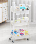 Three Tier Utility Rolling Cart With Lockable Caster Wheels And Three Hanging Baskets, Mobile Storage Shelves Organizer displayed in room