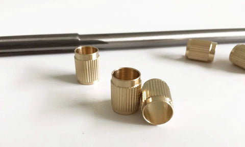 Throttle Shaft Bushing Repair Kit for Carburetors Five Sixteenth Shaft With Eight Brass Bushings and One Reamer shown with tools