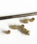 Pro Grade Throttle Shaft Bushing Repair Kit For Three Eighths Carbs, eight brass bushings and carbon steel reamer displayed
