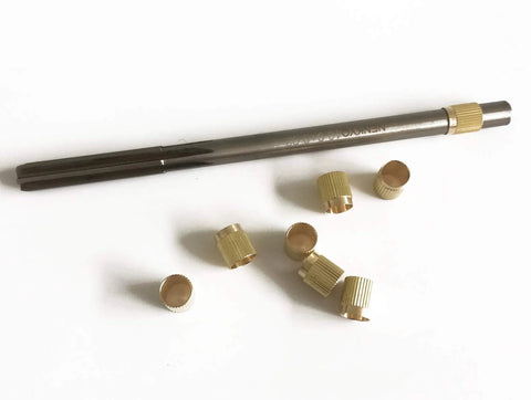 Pro Grade Throttle Shaft Bushing Repair Kit For Three Eighths Carbs, eight brass bushings and carbon steel reamer displayed