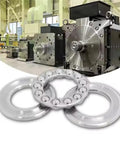 Thrust ball bearings, 2 pcs (51105), chrome steel, 25x42x11 mm, foreground with industrial machinery.