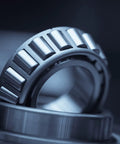 T101/904A1 Thrust Tapered Roller Bearings 1.01" Bore 2" O.D. 0.625" Width, close-up of steel rollers and rings