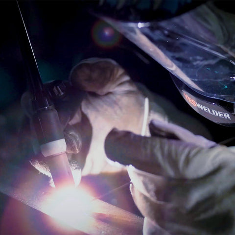 Close-up of ER308L Stainless Steel TIG Welding Rod 1/16 x 16 Inches in use, showing welding process with argon shield gas.