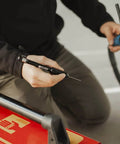Person using Professional TIG Welding Pen Holder With Metal Storage Case And Comfortable Grip Welder Feeder Clip for precise welds