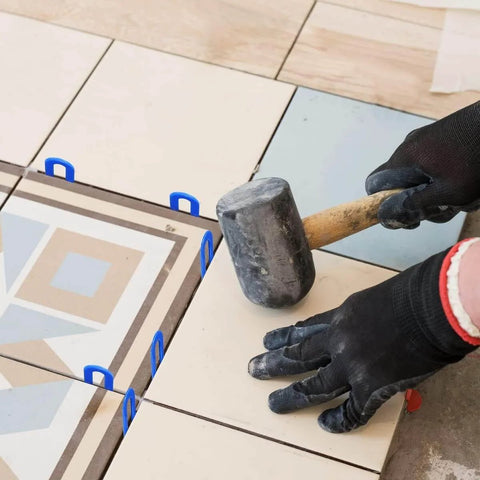 Tile Leveling System One Sixteenth Inch Spacers 300 Pieces Horseshoe U Shape Clips in use during tile installation showing alignment