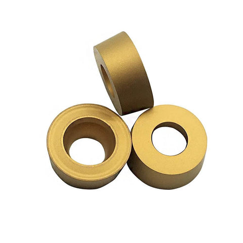 10 Pack RCMT10T3MO R5 Pro Grade Carbide Turning Inserts Tin Coated visible in gold cylindrical shape, ideal for turning.