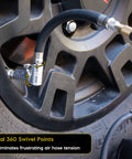 The image shows a Lightning L2X Quick Connect Locking Tire Inflator Air Chuck Extension with 90-degree open flow adapter attached to a tire.