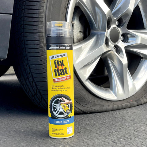Aerosol Emergency Flat Tire Repair And Inflator For X Large Tires With Eco Friendly Formula Seals Punctures Up To Quarter Inch In Seconds And Provides Inflation To Lift The Rim Universal Fit For Cars Trucks And SUVs 24 Oz Can Pack Of 1 next to SUV tire