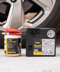 ResQ Tire Repair Kit With 12V Air Compressor And Cigarette Lighter Plug, Emergency Tire Repair Kit For Cars next to a wheel