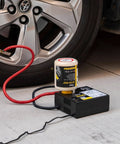 ResQ Tire Repair Kit with 12V Air Compressor and Cigarette Lighter Plug connected to car tire for emergency repair