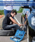 Man repairing car tire on roadside with 68 Piece Heavy Duty Tire Repair Kit With Universal Tools To Fix Punctures And Plug Flats.