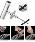 68 Piece Heavy Duty Tire Repair Kit With Universal Tools To Fix Punctures and Plug Flats, including T-handle inserting tool in use