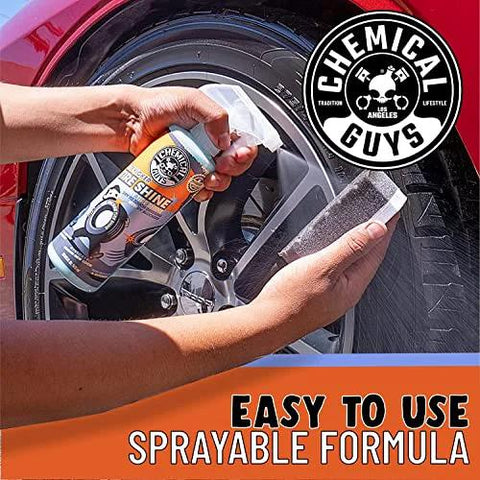 Tire Kicker Sprayable Extra Glossy Tire Shine Spray 16 oz being applied to a car tire for a wet look and long-lasting gloss.