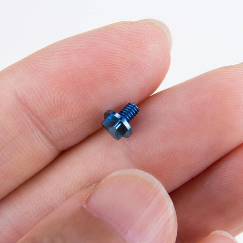 Close-up of a single blue titanium screw for knife handle, part of SaiDian 6Pcs Titanium Blue Screw Set for Microtech UTX-85 Matrix.