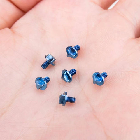 SaiDian 6Pcs Titanium Blue Screw Set Knife Handle Screws for Microtech UTX-85 Matrix shown close-up on a hand.