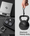 FEGVE Small Titanium Key Ring with Screw Shackle displayed next to camera, scale, and weight for size comparison, heavy duty.