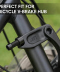 Close-up of 5 Pcs Titanium Alloy M6 x 20mm Allen Hex Bolt installed on bicycle V-brake hub, black color, illustrating compatibility and fit.