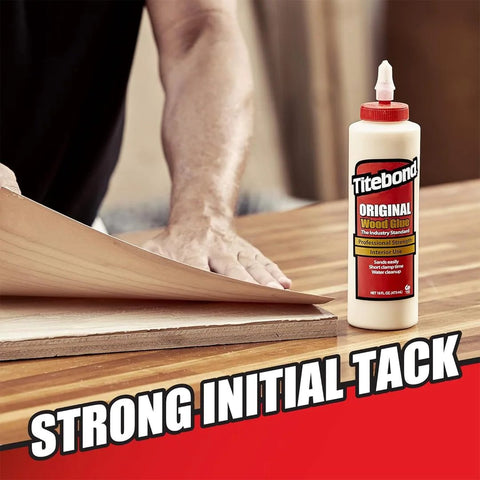 Image of Titebond Original Wood Glue 5063, 8 oz, next to wood surface in use for furniture repair and assembly.