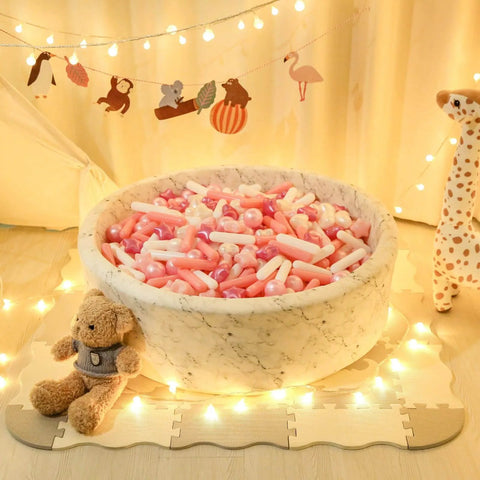 Marble tub filled with pink and white pearl Ball Pit Balls for Toddlers, Pack of 200 BPA Free Phthalate Free Crush Proof Plastic Pit Balls