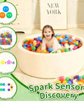 Child playing in ball pit with ball pit balls for toddlers - 50 count star balls different shapes for festival indoor outdoor, party decoration for babies kids (rainbow)