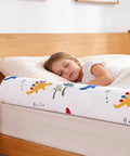 Child sleeping with a 2 Pack Premium Foam Toddler Bed Bumpers With Non Slip Rails For Twin Queen And King Beds Cozy Odor Free Comfort Machine Washable Covers Easy Care 52 By 7 By 5 Inches Safe Sleep Aid For Peaceful Nights