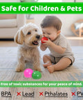 Toddler playing with dog using 200 Ball Pit Balls for Toddlers with Storage Bag - 7 Bright Colors in living room