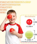 Child holding red ball pit ball with size comparison; Ball Pit Balls Plastic Balls for Ball Pit BPA Free Plastic Balls Crush and Smash Proof Ball 100pcs 2.2" Set for Toddlers for Play Tent Tunnel (7Colors).