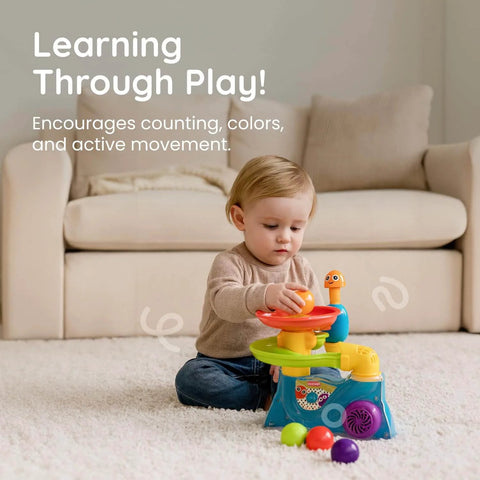 Toddler playing with Set of 5 Multi-Colored Replacement Balls for Ball Popper Toys in living room
