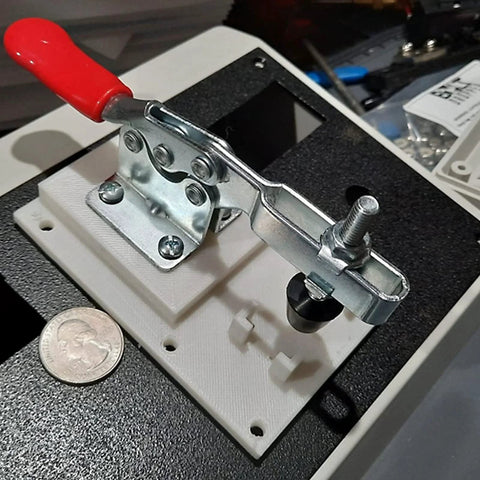 16 Pack Toggle Clamps Set For Woodworking And DIY Projects, 60 Lb Holding Capacity, installed, close-up view with coin for scale