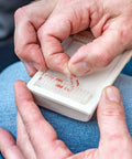 Applying adhesive strip on transponder for Toll Tag Mounting Kit For EZ Pass I Pass SunPass With Alcohol Prep Pad