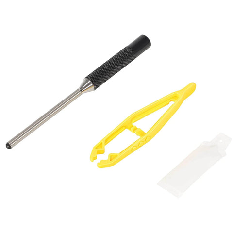 Nail punch tool with yellow aligner and clear plastic cover on white background