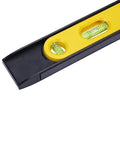 Close-up of a compact 9 inch torpedo level with magnetic base showing three 360 degree vials for accurate layout checks.