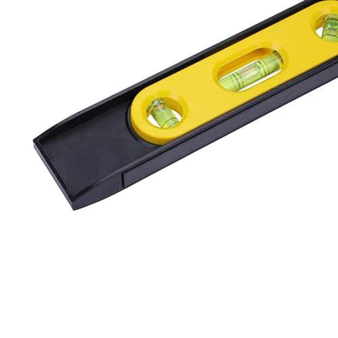Close-up of a compact 9 inch torpedo level with magnetic base showing three 360 degree vials for accurate layout checks.