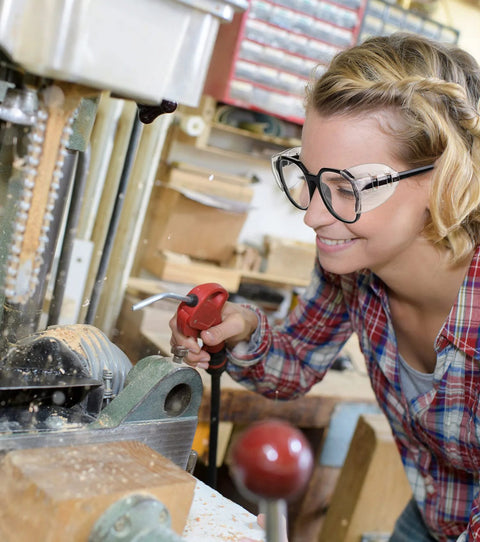Woman wearing Glasses Side Shields for Eye Protection TPU Shields for Small to Medium Eyewear while using power tools
