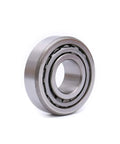 Close-up view of a single high-quality bearing from the Trailer Bearing Repair Kit Set For Three Quarter Inch Straight Spindles Pair Including 11949 Bearings 11910 Races Seals Cotter Pins And Dust Caps High Quality Bearing Steel For Quiet Smooth High Speed Trailer Use UCUT.