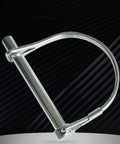 Close-up of a silver trailer coupler pin from the Ten Pack One Quarter By Four Inch Trailer Coupler Pin Set Heavy Duty Locking Towing Pin.