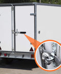 Durable cargo trailer door hasp latch kit with screws and nuts provides secure cam bar locking for trailers trucks containers and enclosed haulers, delivering simple installation and dependable weather resistant security, shown installed on a white trailer.