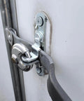 Close-up of Cargo Trailer Door Hasp Keeper Bar Lock Handle For Enclosed Car Hauler Ramp Gates Cam Latch Lock with screws and nut.