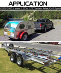 Boat Trailer Hub Bearing Kit For 5200 To 7000 Lb Tandem Axles attached to trailer on road