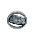 Close-up view of a Trailer Hub And Wheel Bearing Kit For 1-1/4 Inch Axle With LM11949/10 And LM67048/10 Bearings, showing metal bearings.