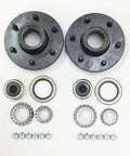 Set Of 2 Trailer Idler Hub Kits 6 On 5.5 Inch Bolt Pattern For 5200 To 6000 Lbs Axles With 2 Inner And 2 Outer Cone Bearings 2.25 X 3.371 Seals And EZ Lube Grease Caps Included Ideal For Replacing Worn Hubs On Utility Trailers displayed